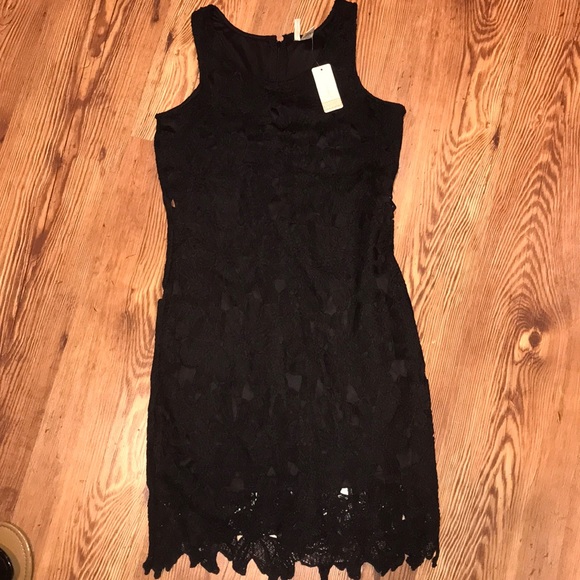 black dress with floral overlay